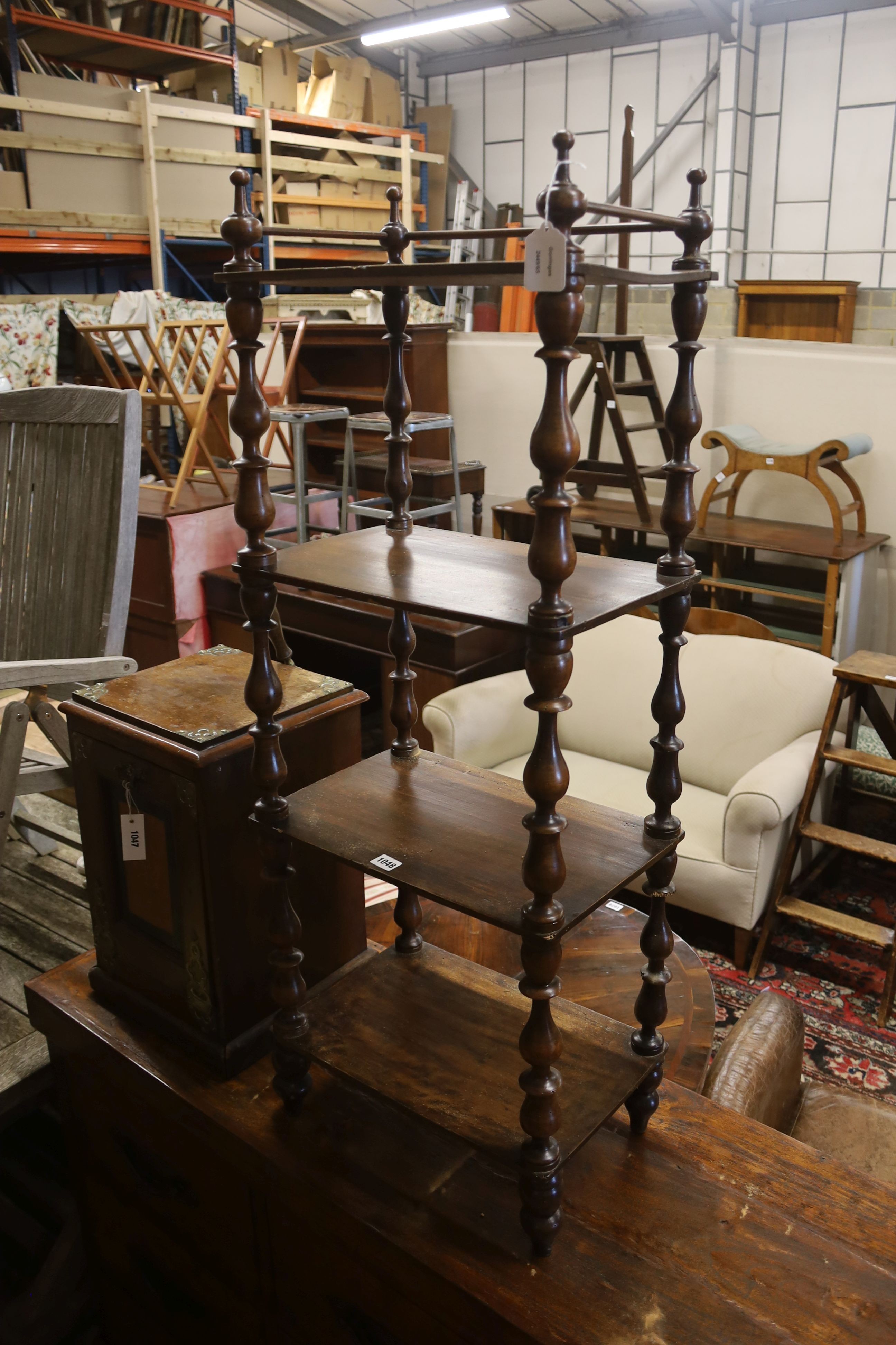 A Victorian mahogany walnut four-tier whatnot, (severely wormed) width 44cm, depth 30cm, height 118cm